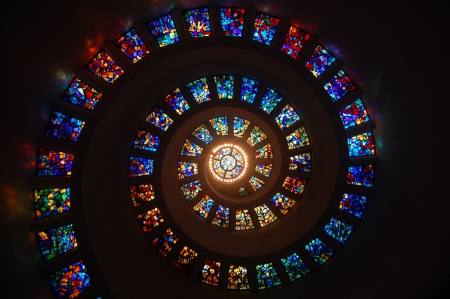 worms-eye-view-of-spiral-stained-glass-decors-through-the-161154